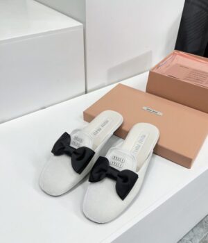 MIU MIU Slides