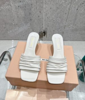 MIU MIU Slides